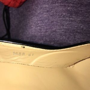 Christian Louboutin black patent leather pumps